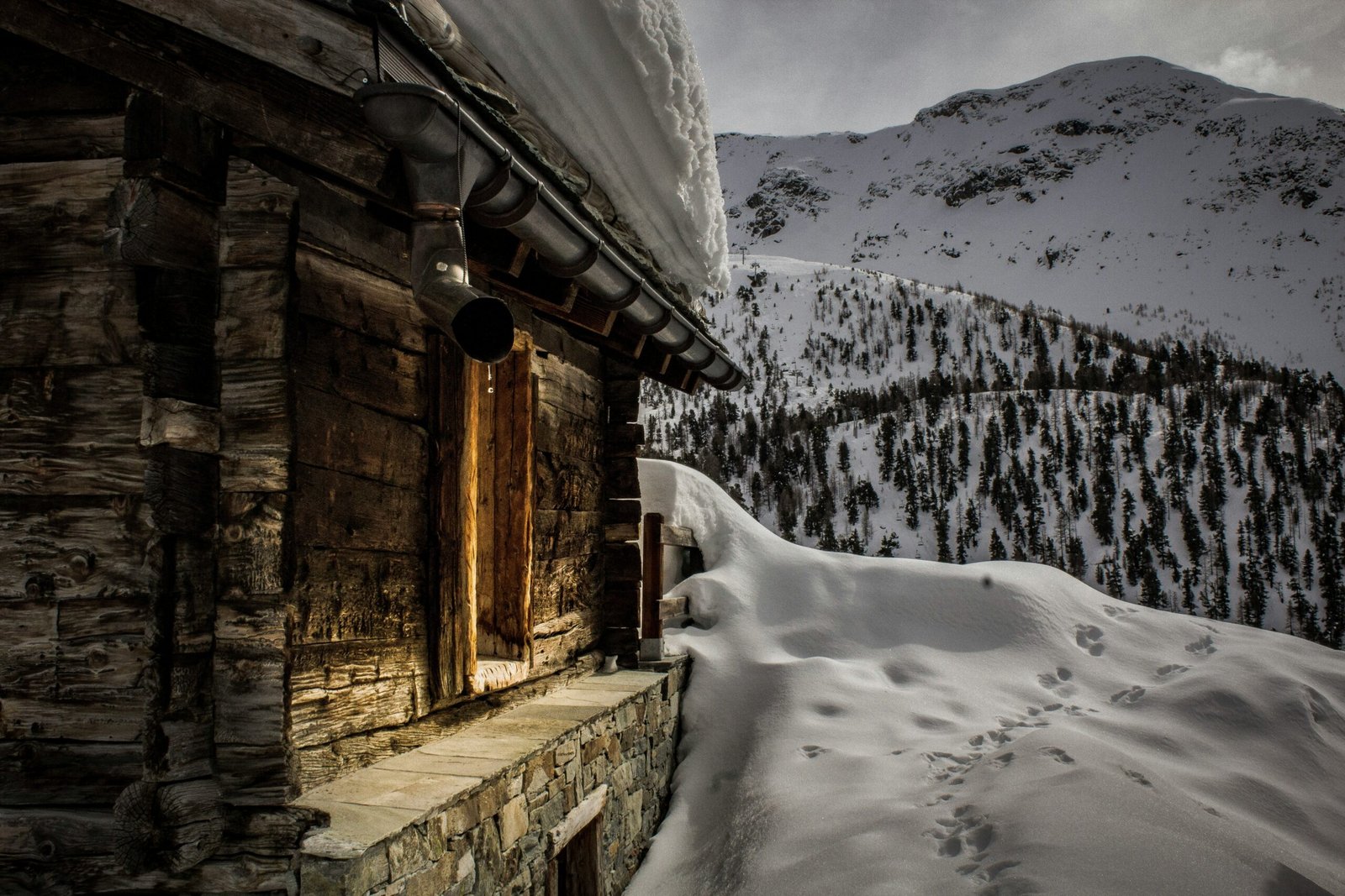 Luxury mountain vacation home front entrance in winter, the type of Park City property that benefits from a strong Airbnb guest screening process.